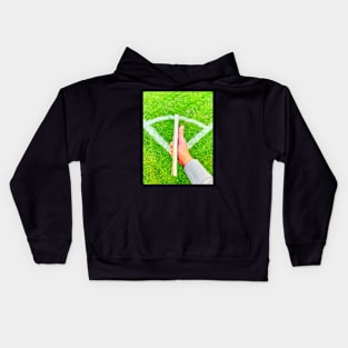 Book in a soccer field Kids Hoodie